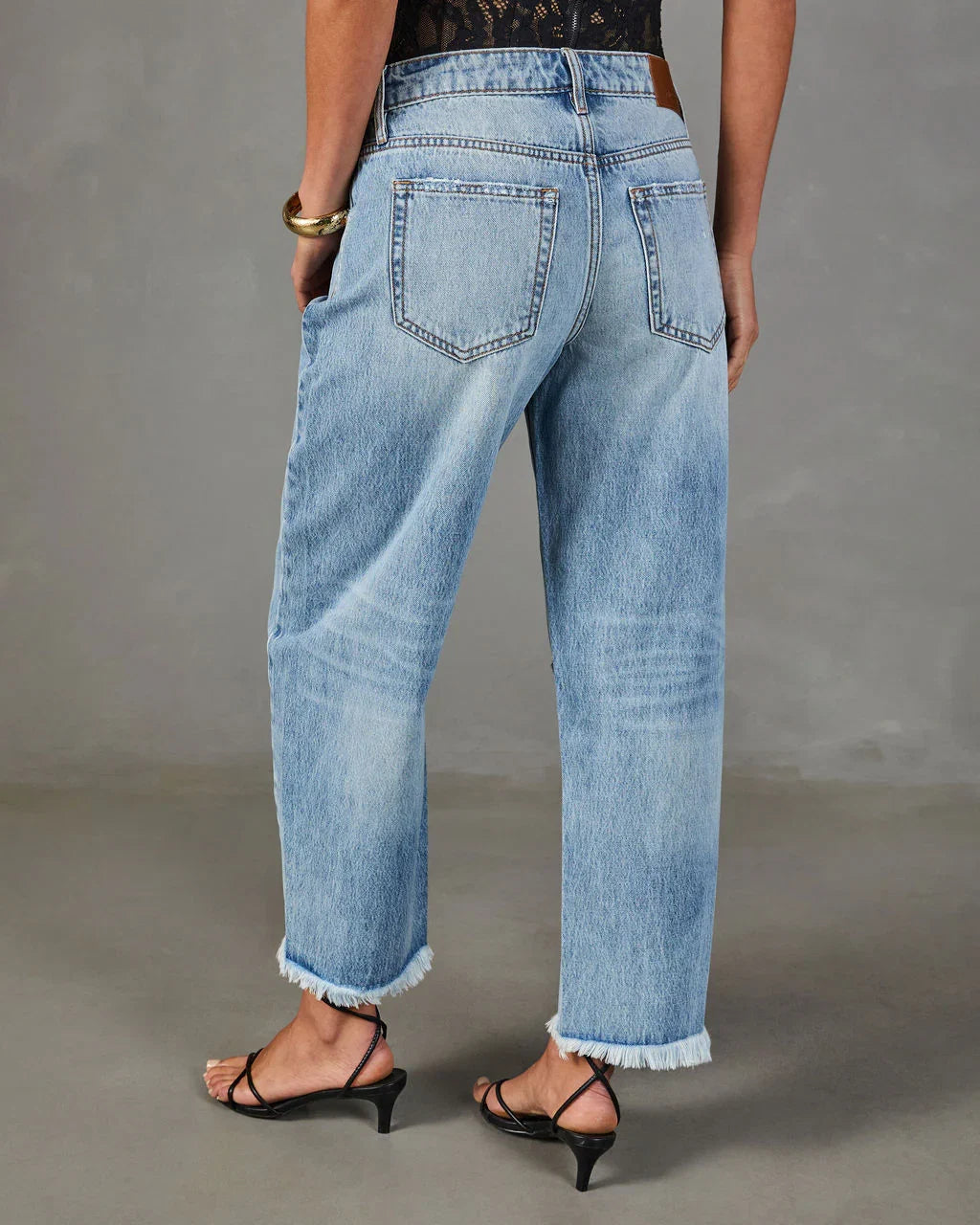 Reworked Frame Rigid Mid Rise Distressed Barrel Leg Jeans