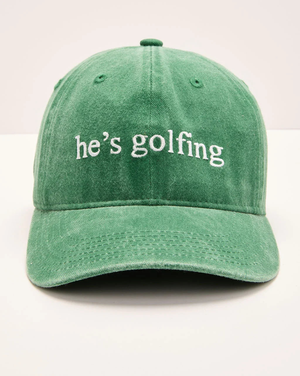 Hes Golfing Baseball Hat