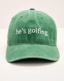 Hes Golfing Baseball Hat