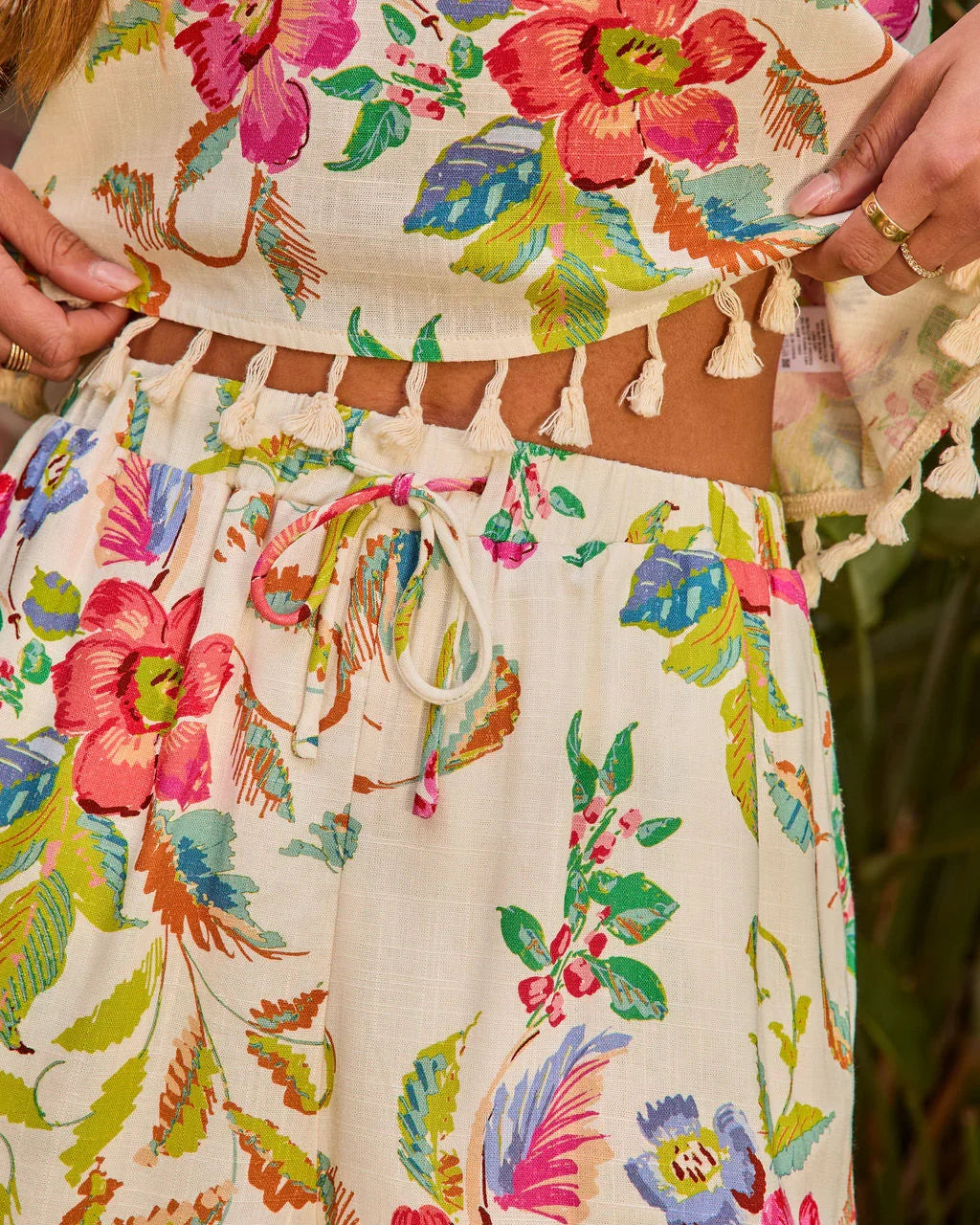 Honeyed Bloom Floral Tassel Hem Shorts