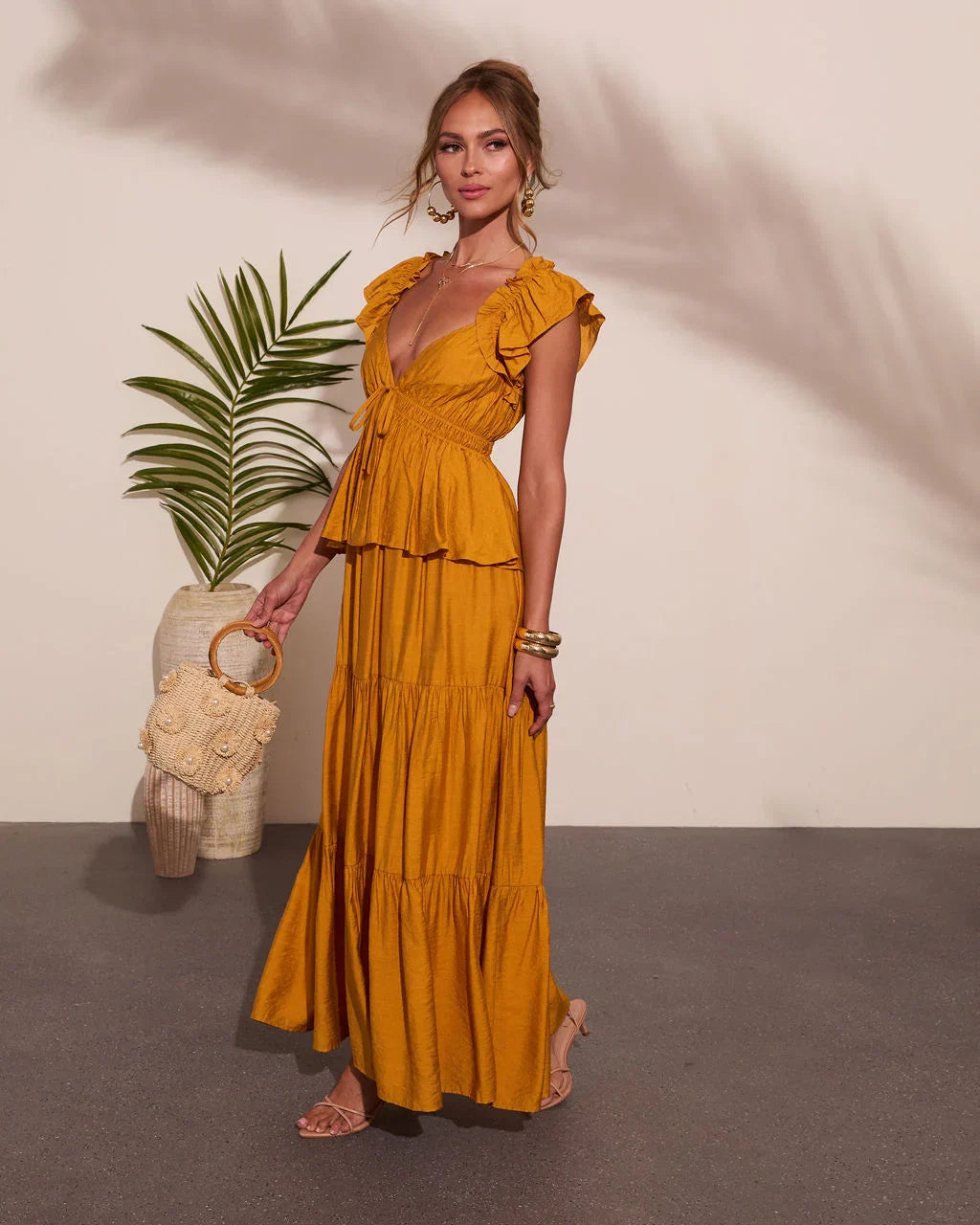 Glow Tiered Peplum Maxi Dress
