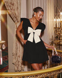 All Wrapped Up Bow Babydoll Mini Dress