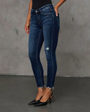 Jaylen Mid Rise Distressed Skinny Jeans