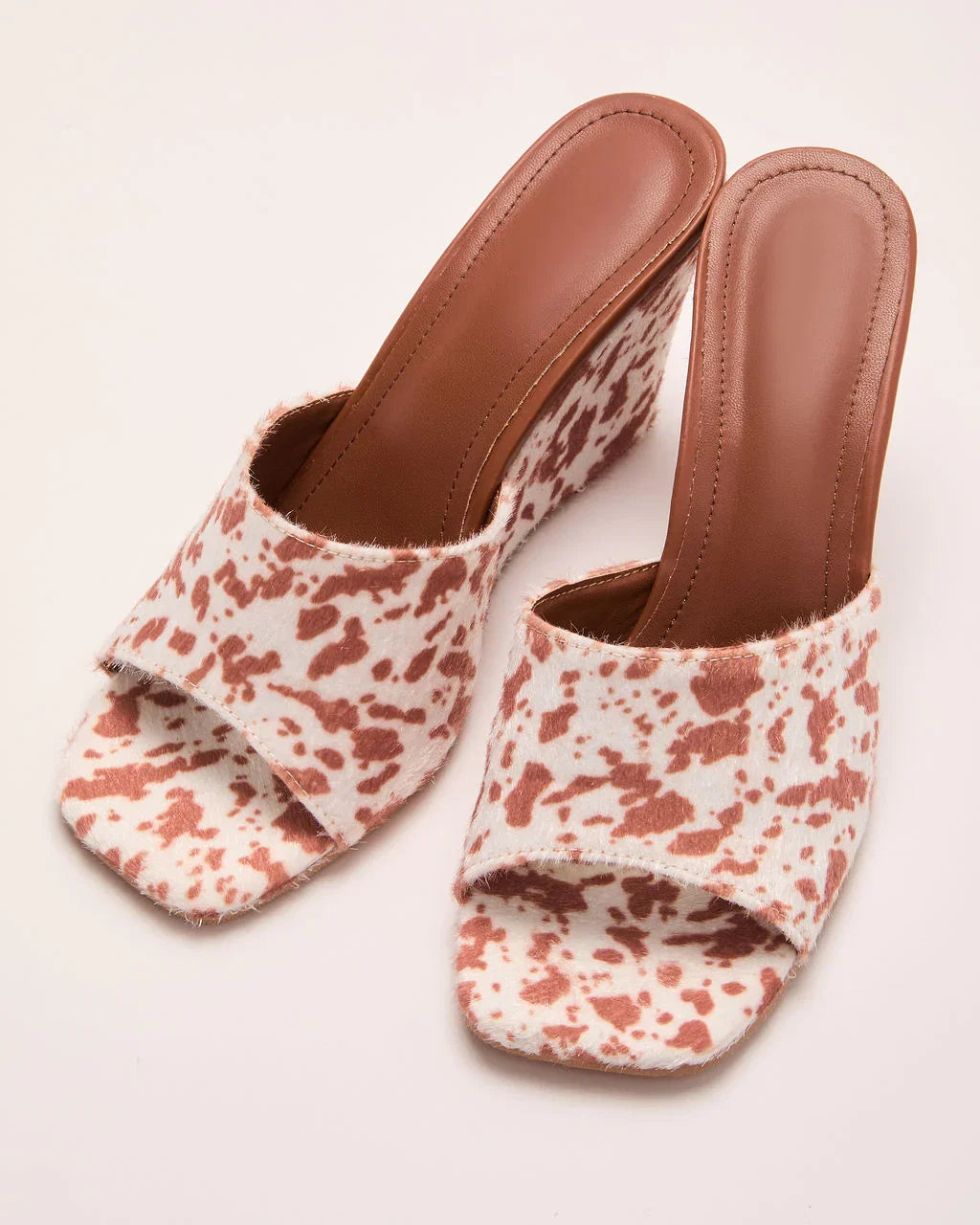 Western Hide Cow Print Wedge Mules